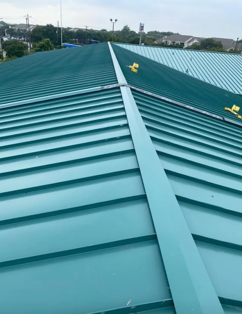 Green commercial metal roof ridge and valley for Metal Roof Repair in Holiday